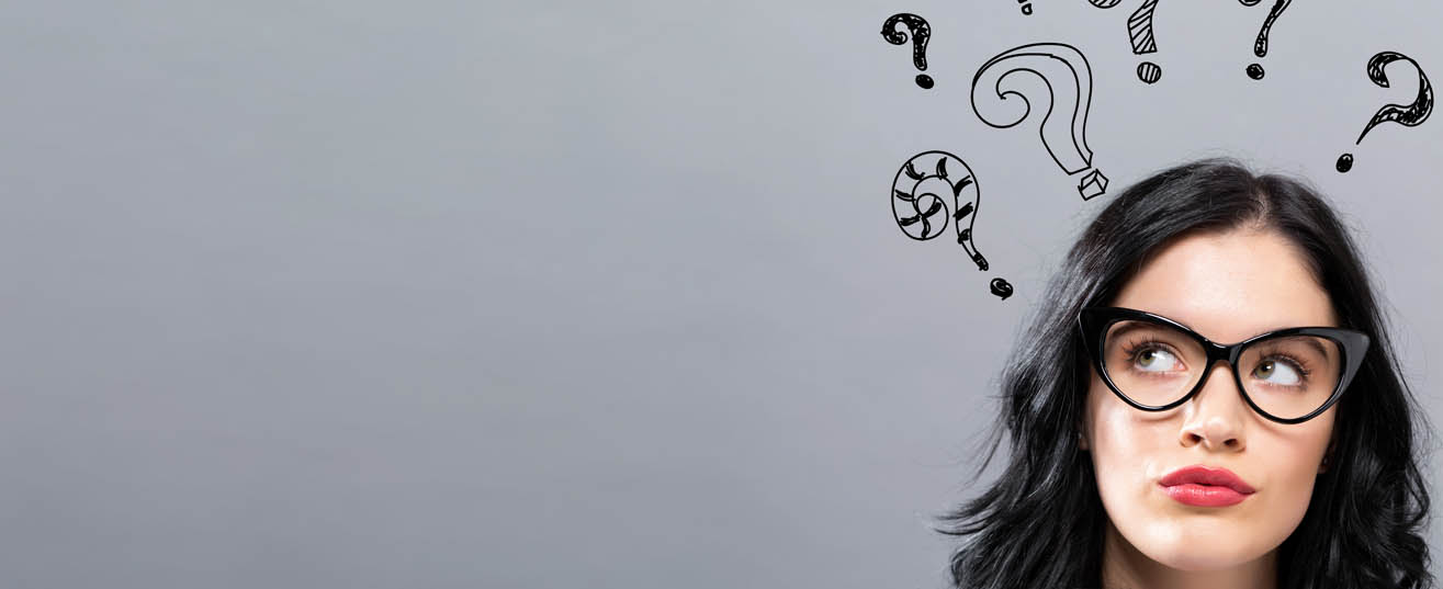 Woman sitting with quizzical expression with question marks floating above her head.